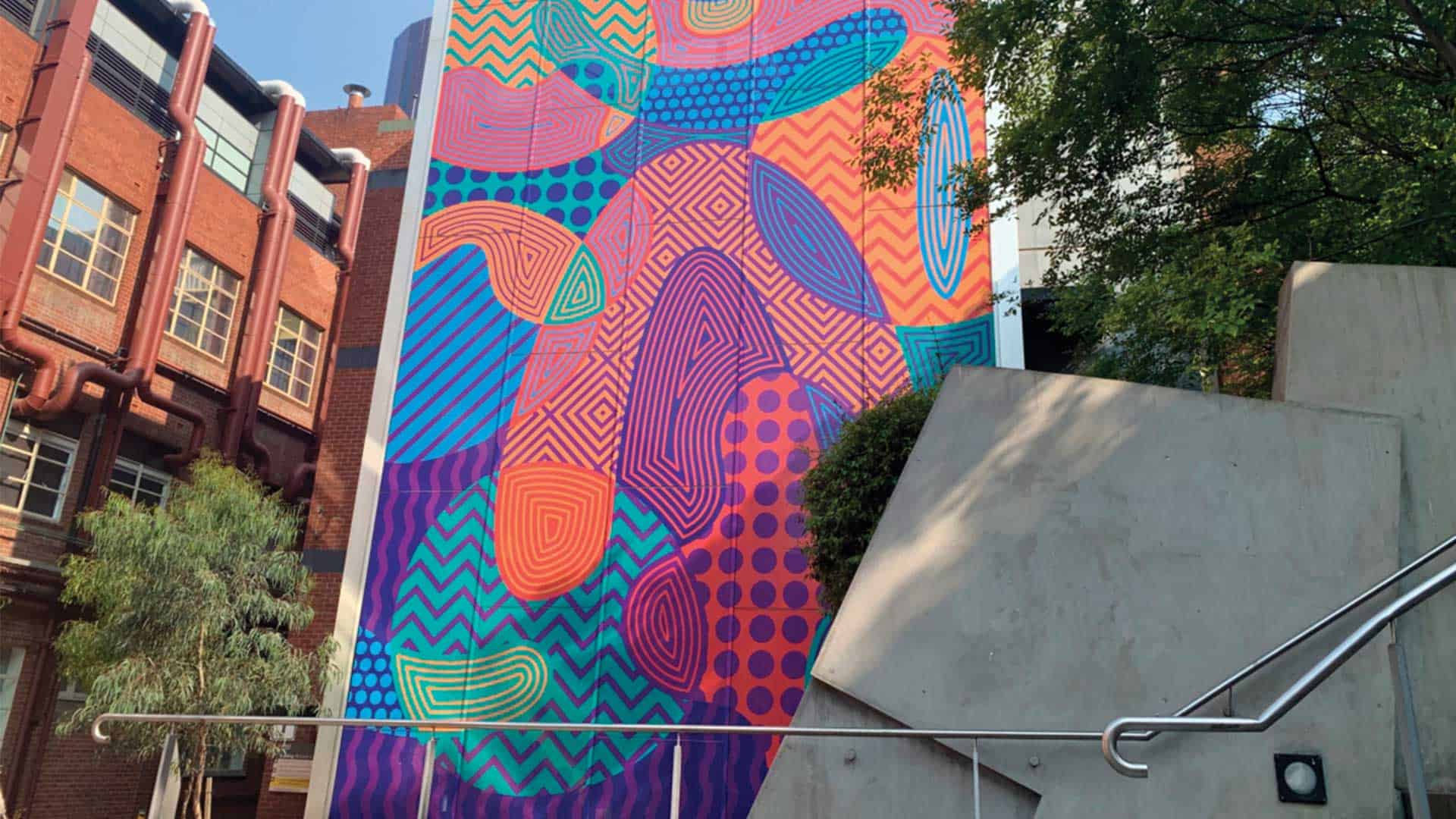 Perforated window film used on an exterior building wrap.